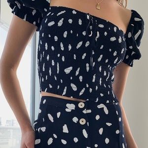 Aritzia Black and White Smocked Puff Sleeve Crop Top